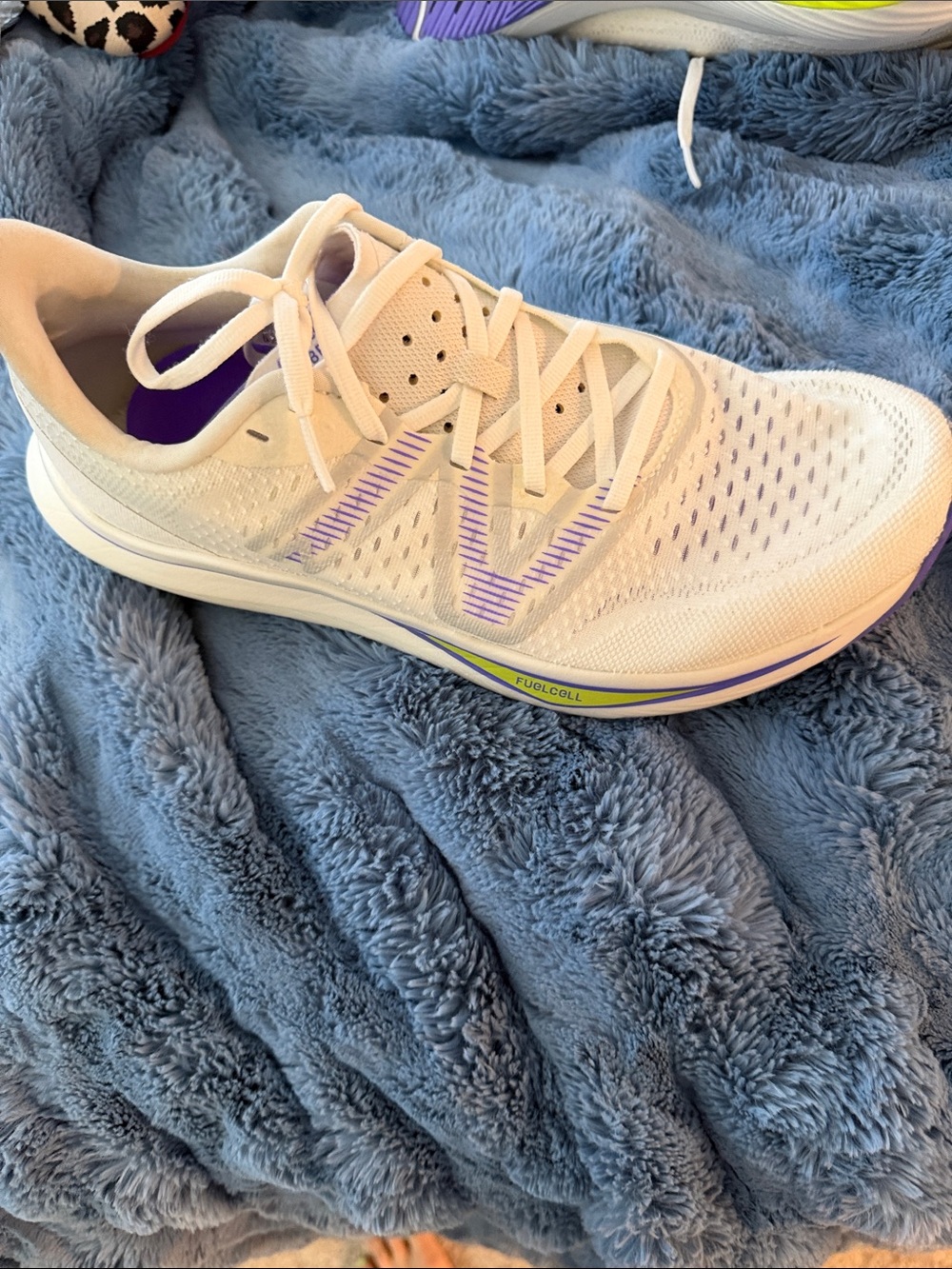 New Balance Women’s White Athletic Running Shoe with Purple Accents